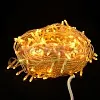 Гирлянда-нить LED Стринг Лайт желтого свечения длиной 20 метров, свернутая в бухту.