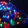 Гирлянда-нить LED Твинкл Лайт длиной 10 метров, светящаяся в мультицветном режиме, на белом фоне.