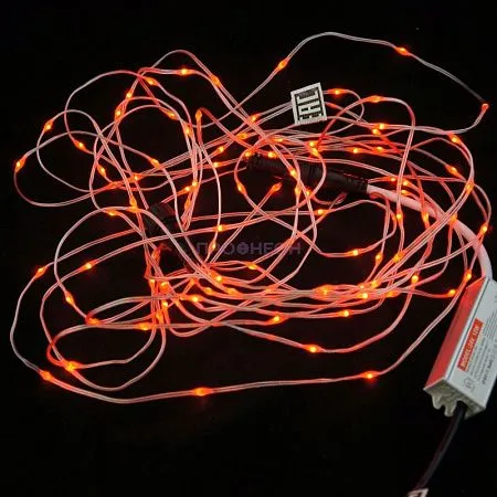 Крупный план светодиодной нити PRF-TR-10M-100ML-24V-R красного цвета, 10 метров