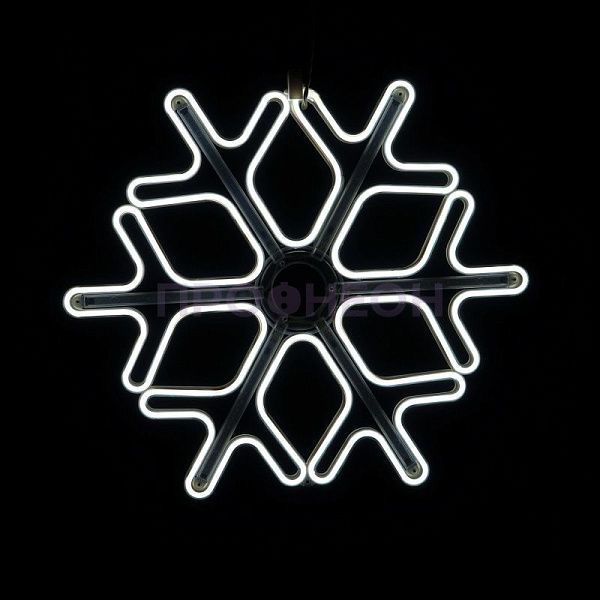 Крупный план ветвей светодиодной снежинки, белые LED-диоды на гибком несущем шлейфе, влагозащищенный провод.