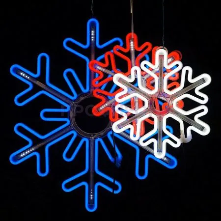 Крупный план светодиодной снежинки: белые LED-диоды, провода и крепления, динамическая подсветка