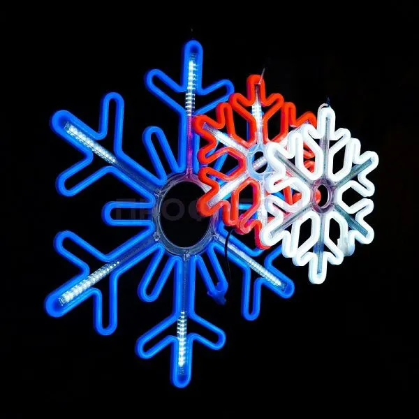 Крупный план светодиодной снежинки: белые LED-диоды, провода и крепления, динамическая подсветка