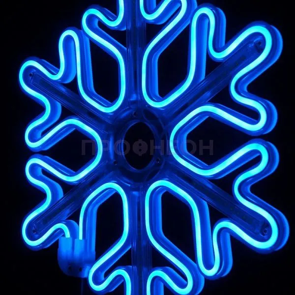 Крупный план светодиодной снежинки LED: синие диоды, динамические переливы, прочный плоский корпус
