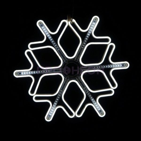 Крупный план ветвей светодиодной снежинки, белые LED-диоды на гибком несущем шлейфе, влагозащищенный провод.