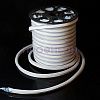 Крупный план гибкого неона LED Neon Flex красного цвета: светодиодная нить, силиконовая оболочка, провод
