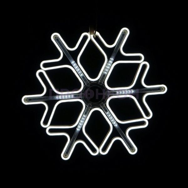 Крупный план ветвей светодиодной снежинки, белые LED-диоды на гибком несущем шлейфе, влагозащищенный провод.